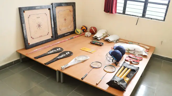 Sports equipment: carrom boards, cricket kit, badminton rackets and balls